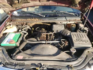 1999 Jeep Grand Cherokee Laredo with VIN 1J4GW58SXXC706962, listed as a Copart auction lot 88325515 with Not provided miles and Clean title. Bid and sale history available at DreamBid. Image 12.