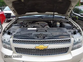 2013 Chevrolet Suburban LT with VIN 1GNSKJE74DR166223, listed as a IAAI auction lot 42172184 with 200,901 mi miles and . Bid and sale history available at DreamBid. Image 10.