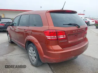 2014 Dodge Journey American Value Pkg with VIN 3C4PDCAB7ET258997, listed as a IAAI auction lot 41375834 with 230,868 mi miles. Bid and sale history available at carsss.com. Image 3.