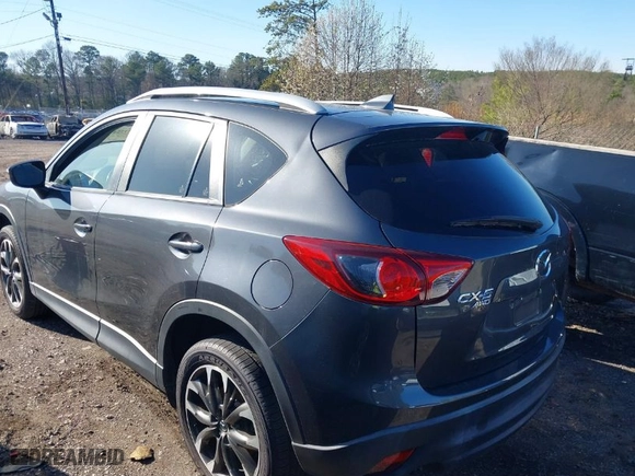 2016 Mazda CX-5 Grand Touring with VIN JM3KE4DY5G0843355, listed as a IAAI auction lot 41775499 with NaN miles. Bid and sale history available at carsss.com. Image 3.