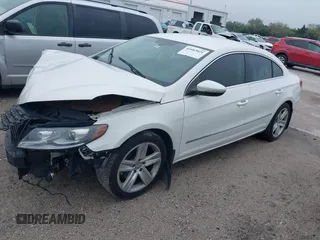 2013 Volkswagen CC Sport Plus z VIN WVWBP7AN6DE557611, wystawiony jako IAAI lot #41663021 z przebiegiem 130 393 mil mil oraz . Historia ofert i sprzedaży dostępna na DreamBid. Obrazek 2.