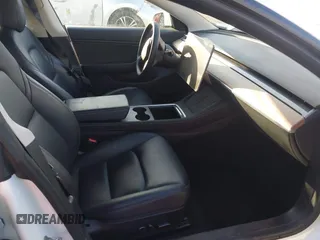 2021 Tesla Model 3 Long Range z VIN 5YJ3E1EB0MF936609, wystawiony jako IAAI lot #41599411 z przebiegiem 55 993 mil mil oraz . Historia ofert i sprzedaży dostępna na DreamBid. Obrazek 5.