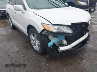 2015 Acura RDX Tech Pkg with VIN 5J8TB4H57FL021547, listed as a IAAI auction lot 41978867 with 104,719 mi miles. Bid and sale history available at carsss.com. Image 18.