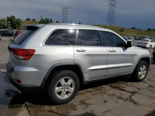 2011 Jeep Grand Cherokee Laredo with VIN 1J4RR4GG1BC576277, listed as a Copart auction lot 63220925 with 149,573 mi miles and Salvage title. Bid and sale history available at DreamBid. Image 3.