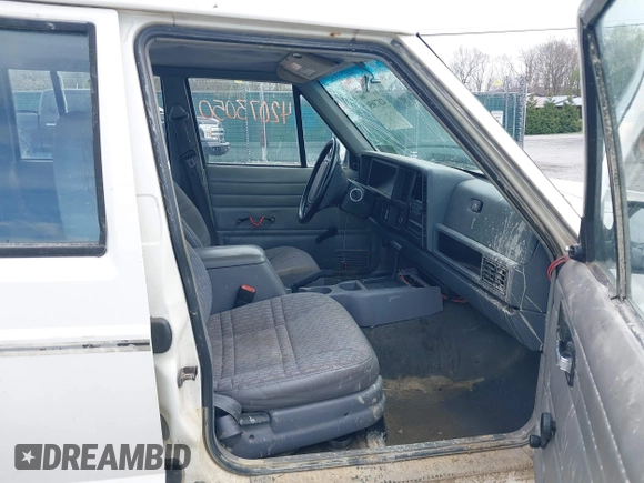 1996 Jeep Cherokee SE with VIN 1J4FJ28S3TL241251, listed as a IAAI auction lot 42073050 with 156,523 mi miles and . Bid and sale history available at DreamBid. Image 5.
