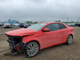 2012 Kia Forte SX с VIN KNAFW6A33C5633553, выставлен на аукционе Copart как лот 55179625 с пробегом 81 689 миль миль и Списание • Salvage title. История ставок и продаж доступна на DreamBid. Изображение 1.