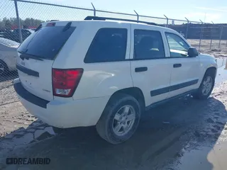 2005 Jeep Grand Cherokee Laredo with VIN 1J4GS48N75C505209, listed as a IAAI auction lot 41452637 with 263,653 mi miles. Bid and sale history available at carsss.com. Image 4.