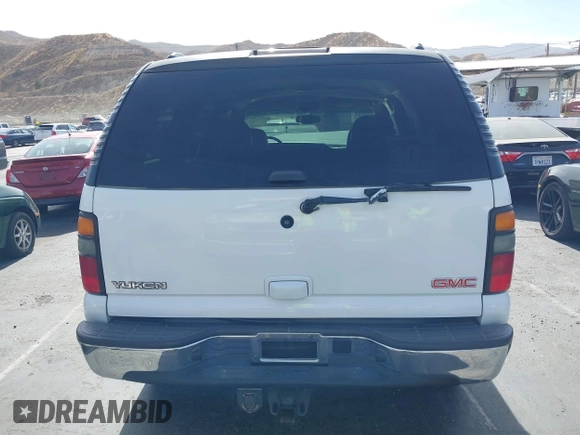 2005 GMC Yukon SLT z VIN 1GKEC13T05R273813, wystawiony jako IAAI lot #40796306 z przebiegiem 239 435 mil mil oraz . Historia ofert i sprzedaży dostępna na DreamBid. Obrazek 16.