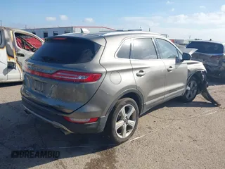 2017 Lincoln MKC Premiere with VIN 5LMCJ1D92HUL71022, listed as a IAAI auction lot 38628790 with 141,930 mi miles. Bid and sale history available at carsss.com. Image 4.