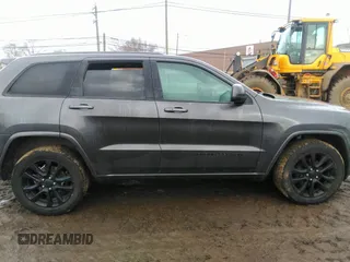 2020 Jeep Grand Cherokee Altitude with VIN 1C4RJFAGXLC211518, listed as a IAAI auction lot 41668994 with 130,371 mi miles. Bid and sale history available at carsss.com. Image 13.