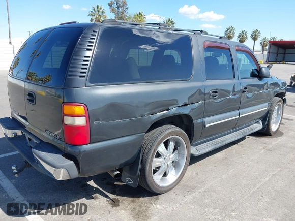2003 Chevrolet Suburban LS with VIN 3GNEC16T63G115908, listed as a IAAI auction lot 41950165 with 202,075 mi miles. Bid and sale history available at carsss.com. Image 4.