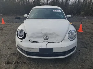 2014 Volkswagen Beetle 1.8T z VIN 3VWJ17AT1EM663680, wystawiony jako Copart lot #48163255 z przebiegiem 67 809 mil mil oraz Szkoda całkowita • Salvage title. Historia ofert i sprzedaży dostępna na DreamBid. Obrazek 5.