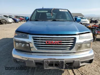 2012 GMC Canyon z VIN 1GTJ6MF94C8123614, wystawiony jako Copart lot #65770644 z przebiegiem 197 560 mil mil oraz Czysty tytuł • Clean title. Historia ofert i sprzedaży dostępna na DreamBid. Obrazek 5.