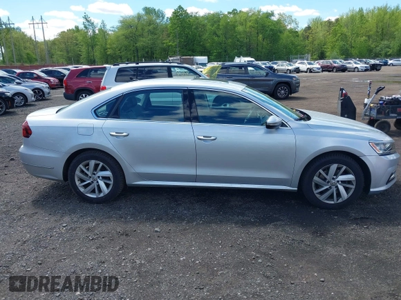 2018 Volkswagen Passat SE z VIN 1VWBA7A38JC004818, wystawiony jako IAAI lot #42205205 z przebiegiem 105 559 mil mil oraz . Historia ofert i sprzedaży dostępna na DreamBid. Obrazek 14.