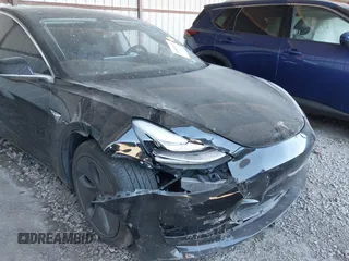 2019 Tesla Model 3 Mid Range with VIN 5YJ3E1EA4KF399151, listed as a IAAI auction lot 41840425 with Not Provided miles and . Bid and sale history available at DreamBid. Image 6.