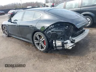 2010 Porsche Panamera Turbo z VIN WP0AC2A7XAL091443, wystawiony jako IAAI lot #41702162 z przebiegiem 124 151 mil mil oraz . Historia ofert i sprzedaży dostępna na DreamBid. Obrazek 3.