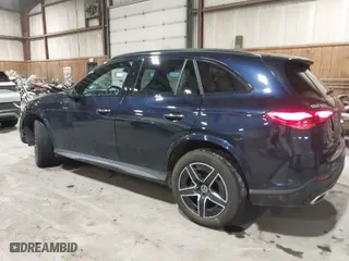 2023 Mercedes-Benz GLC with VIN W1NKM4HB9PF028986, listed as a IAAI auction lot 41611041 with 22,617 mi miles. Bid and sale history available at carsss.com. Image 3.