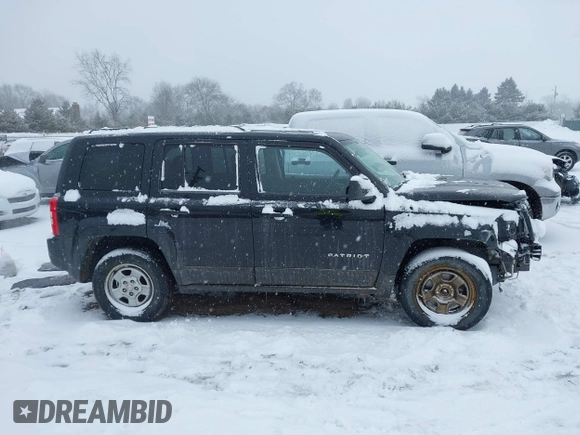 2014 Jeep Patriot Sport with VIN 1C4NJRBB2ED841808, listed as a IAAI auction lot 41595178 with 146,323 mi miles and . Bid and sale history available at DreamBid. Image 14.