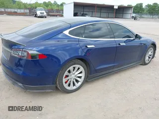 2016 Tesla Model S 90D with VIN 5YJSA1E4XGF168165, listed as a IAAI auction lot 42220139 with Not provided miles and . Bid and sale history available at DreamBid. Image 4.