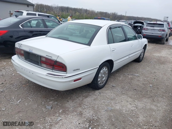 1999 Buick Park Avenue Ultra with VIN 1G4CU5217X4658627, listed as a IAAI auction lot 42013174 with 148,856 mi miles. Bid and sale history available at carsss.com. Image 4.