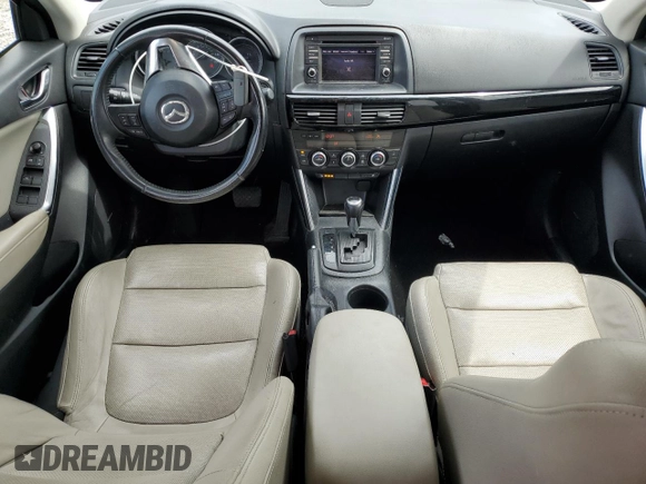 2014 Mazda CX-5 Grand Touring with VIN JM3KE4DY3E0304908, listed as a Copart auction lot 53873655 with 144,382 mi miles and Salvage Title. Bid and sale history available at DreamBid. Image 8.
