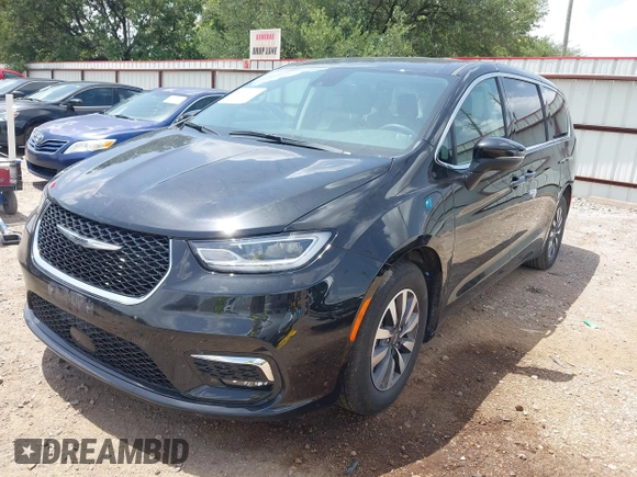 2023 Chrysler Pacifica Hybrid Touring L with VIN 2C4RC1L70PR622000, listed as a IAAI auction lot 42711826 with 65,109 mi miles and . Bid and sale history available at DreamBid. Image 18.