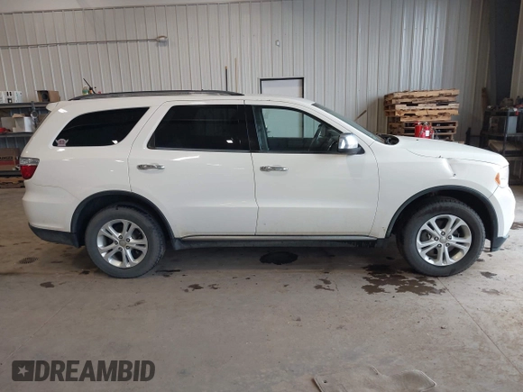 2012 Dodge Durango SXT with VIN 1C4RDJAGXCC295138, listed as a IAAI auction lot 42333094 with 96,581 mi miles and . Bid and sale history available at DreamBid. Image 13.