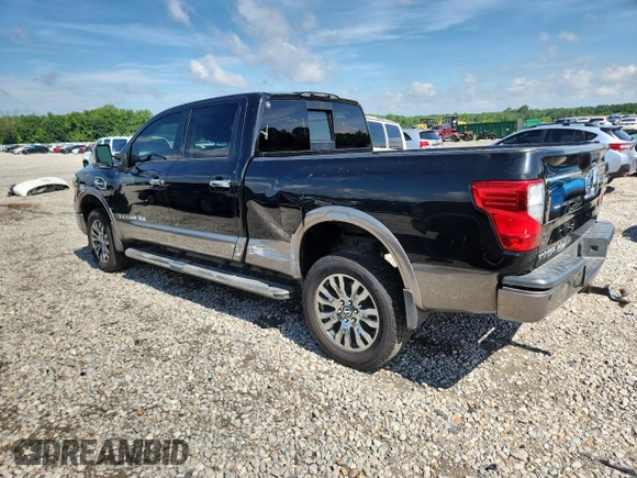 2016 Nissan Titan SV with VIN 1N6BA1F24GN511628, listed as a Copart auction lot 62965815 with 216,041 mi miles and Clean title. Bid and sale history available at DreamBid. Image 2.