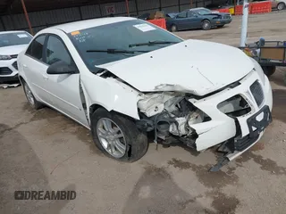 2006 Pontiac G6 6-Cyl z VIN 1G2ZG558364124834, wystawiony jako IAAI lot #41815411 z przebiegiem Nie podano mil oraz . Historia ofert i sprzedaży dostępna na DreamBid. Obrazek 1.