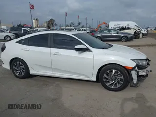 2018 Honda Civic EX with VIN 2HGFC2F74JH566761, listed as a IAAI auction lot 42117730 with 73,946 mi miles and . Bid and sale history available at DreamBid. Image 14.