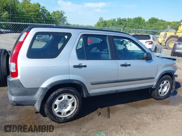 2006 Honda CR-V LX z VIN SHSRD78596U445523, wystawiony jako IAAI lot #42212230 z przebiegiem 141 228 mil mil oraz . Historia ofert i sprzedaży dostępna na DreamBid. Obrazek 14.