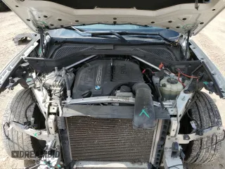 2018 BMW X6 sDrive35i with VIN 5UXKU0C52J0G80569, listed as a Copart auction lot 49991705 with 77,531 mi miles and Salvage Title. Bid and sale history available at carsss.com. Image 12.