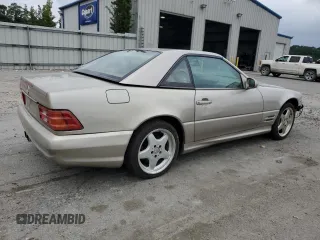 1999 Mercedes-Benz SL 500 z VIN WDBFA68F4XF184352, wystawiony jako Copart lot #57874355 z przebiegiem 215 118 mil mil oraz Tytuł czysty. Historia ofert i sprzedaży dostępna na DreamBid. Obrazek 3.