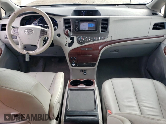 2012 Toyota Sienna XLE AAS with VIN 5TDYK3DC0CS250830, listed as a Copart auction lot 73323284 with 147,580 mi miles and Salvage Title. Bid and sale history available at DreamBid. Image 8.