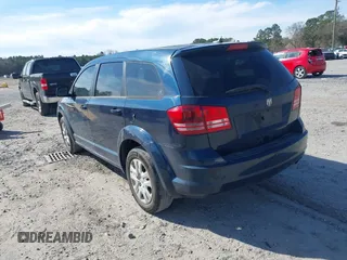 2014 Dodge Journey SE with VIN 3C4PDCABXET277723, listed as a IAAI auction lot 41709752 with 161,587 mi miles and . Bid and sale history available at DreamBid. Image 3.
