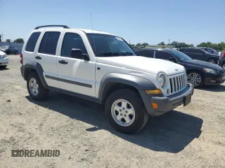 2005 Jeep Liberty Sport with VIN 1J8GL48K75W533267, listed as a Copart auction lot 55229435 with 154,305 mi miles and Salvage Title. Bid and sale history available at DreamBid. Image 4.