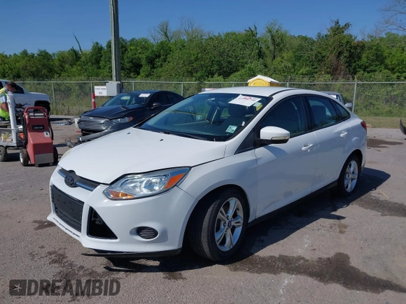 2013 Ford Focus SE with VIN 1FADP3F26DL203377, listed as a IAAI auction lot 41998750 with 70,000 mi miles. Bid and sale history available at carsss.com. Image 2.