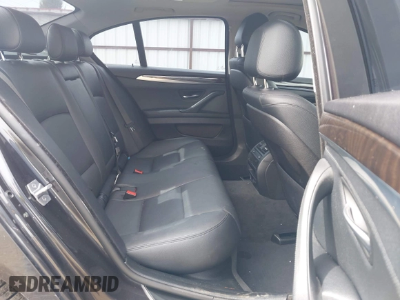 2014 BMW 5 Series 528i xDrive with VIN WBA5A7C55ED617099, listed as a IAAI auction lot 42003348 with 85,262 mi miles and . Bid and sale history available at DreamBid. Image 8.