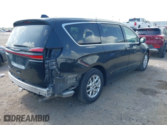 2023 Chrysler Pacifica Touring L z VIN 2C4RC1BG6PR628076, wystawiony jako IAAI lot #42553624 z przebiegiem 59 442 mil mil oraz . Historia ofert i sprzedaży dostępna na DreamBid. Obrazek 4.