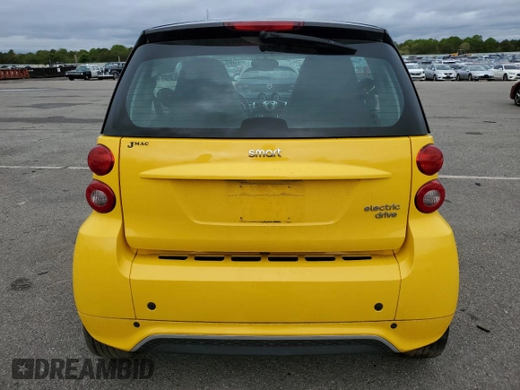 2015 Smart fortwo Passion with VIN WMEEJ9AA5FK831751, listed as a Copart auction lot 58025575 with 55,512 mi miles and Salvage title. Bid and sale history available at DreamBid. Image 6.