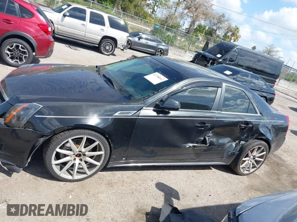 2011 Cadillac CTS Sedan Luxury with VIN 1G6DH5EY8B0116879, listed as a IAAI auction lot 41708842 with 124,550 mi miles. Bid and sale history available at carsss.com. Image 14.