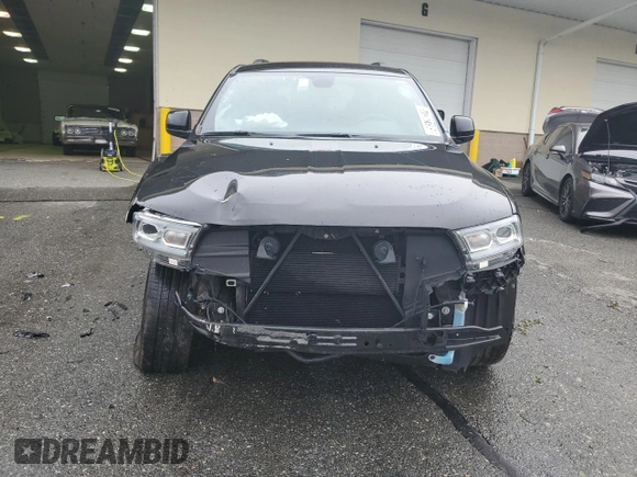 2023 Dodge Durango SXT with VIN 1C4RDHAG5PC634936, listed as a Copart auction lot 57282195 with 56,689 mi miles and Salvage title. Bid and sale history available at DreamBid. Image 5.