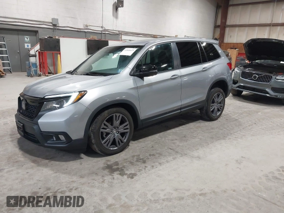 2021 Honda Passport EX-L with VIN 5FNYF8H56MB000107, listed as a IAAI auction lot 41868429 with 66,572 mi miles and . Bid and sale history available at DreamBid. Image 19.