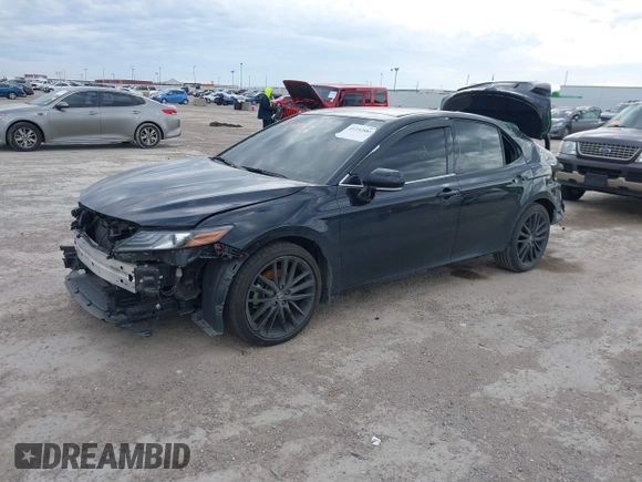 2022 Toyota Camry XSE z VIN 4T1K61AK2NU700840, wystawiony jako IAAI lot #41352884 z przebiegiem 98 634 mil mil oraz . Historia ofert i sprzedaży dostępna na DreamBid. Obrazek 15.