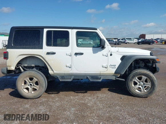2020 Jeep Wrangler Unlimited Sport with VIN 1C4HJXDM2LW262867, listed as a IAAI auction lot 42303520 with 56,461 mi miles and . Bid and sale history available at DreamBid. Image 13.