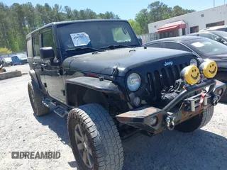 2014 Jeep Wrangler Unlimited Sahara z VIN 1C4BJWEGXEL317725, wystawiony jako IAAI lot #42030271 z przebiegiem 115 664 mil mil oraz . Historia ofert i sprzedaży dostępna na DreamBid. Obrazek 1.