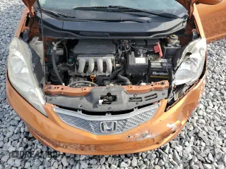 2011 Honda Fit Sport with VIN JHMGE8H59BC007883, listed as a Copart auction lot 54194635 with 123,256 mi miles and Salvage Title. Bid and sale history available at DreamBid. Image 11.