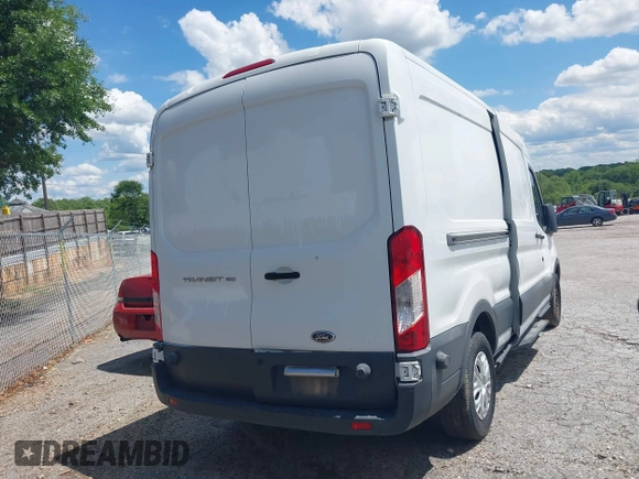 2015 Ford Transit Cargo with VIN 1FTNE2CMXFKA90627, listed as a IAAI auction lot 40601859 with 230,893 mi miles. Bid and sale history available at carsss.com. Image 4.