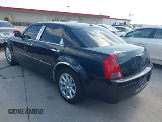 2007 Chrysler 300 with VIN 2C3LA43R57H875094, listed as a IAAI auction lot 42059007 with 125,067 mi miles. Bid and sale history available at carsss.com. Image 3.