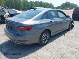 2019 Volkswagen Jetta SEL z VIN 3VWE57BU0KM110267, wystawiony jako IAAI lot #42161272 z przebiegiem 63 955 mil mil oraz . Historia ofert i sprzedaży dostępna na DreamBid. Obrazek 4.